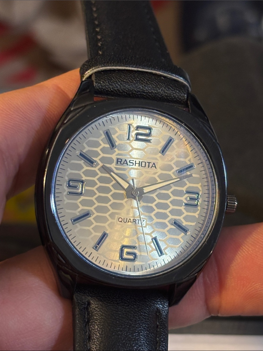 Men's Black Strap Quartz Watch with Silver Honeycomb Dial Accent